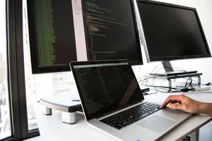 Photo of a software developer's workspace