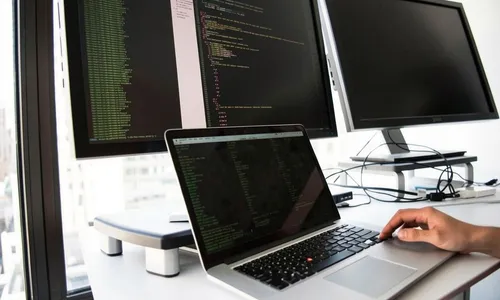 Photo of a software developer's workspace